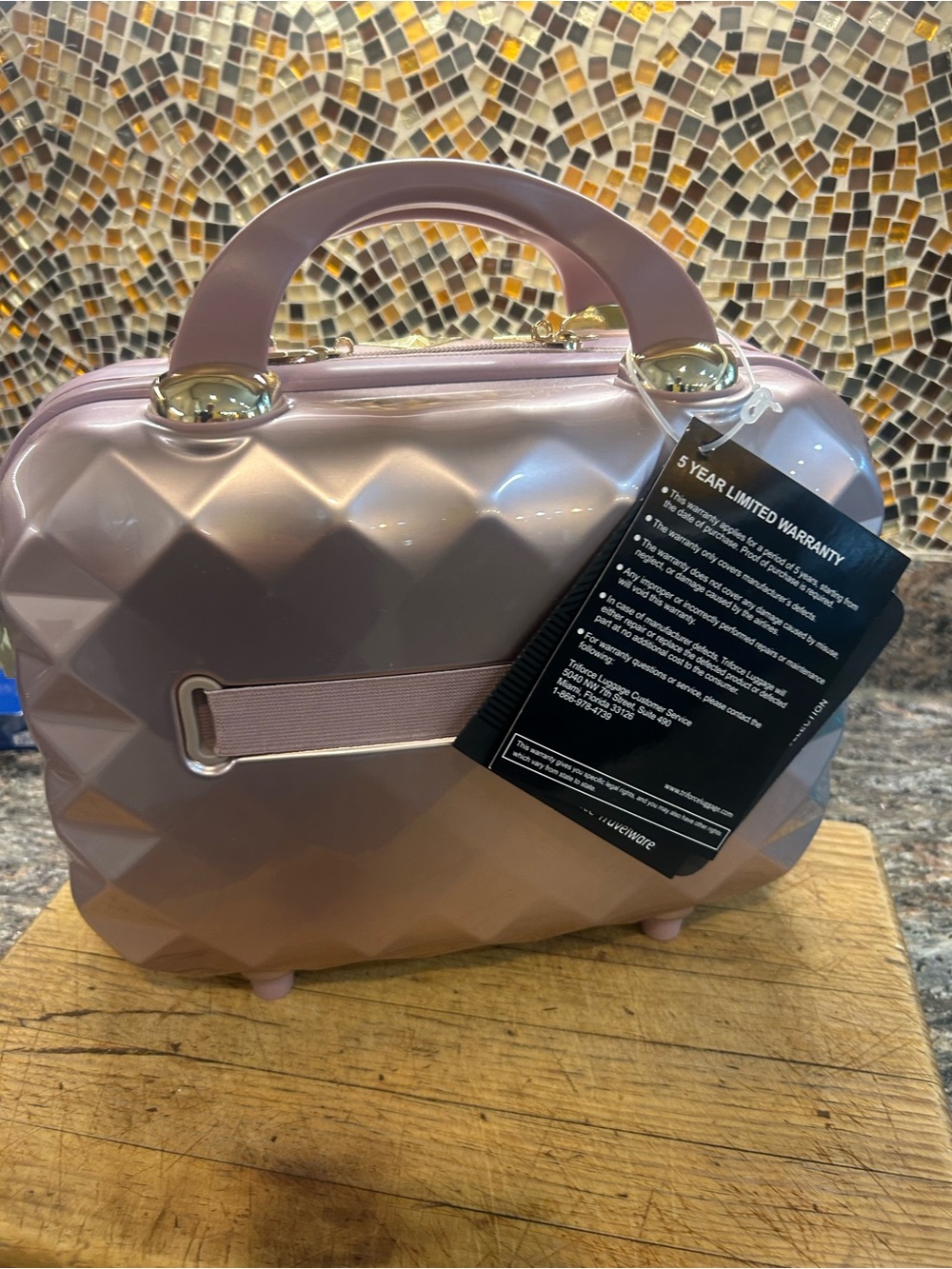 Rose gold TRIFORCE hard side cosmetic case . NWT